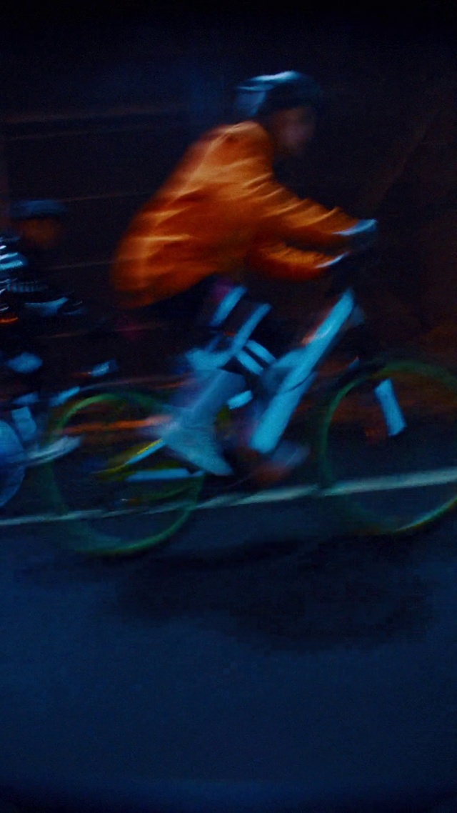 Video Reference: Blue, Light, Bicycle, Vehicle, Performance, Recreation, Night, Cycling