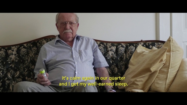 Video Reference: Photograph, Facial expression, Product, Sitting, Photo caption, Human, Textile, Adaptation, Smile, Photography