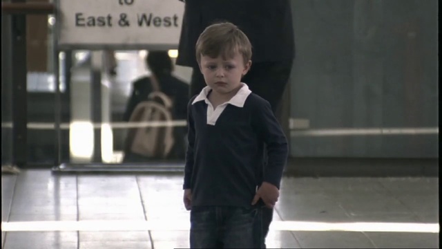 Video Reference: Photograph, Black, Standing, Snapshot, Male, Child, Suit, Outerwear, Human, Gentleman, Person