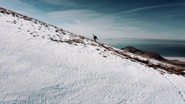 Video Reference: Cloud, Sky, Snow, Slope, Mountain, Glacial landform, Terrain, Ice cap, Freezing, Mountainous landforms