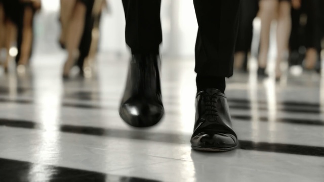 Video Reference: Footwear, Shoe, Fashion, Standing, Black-and-white, Leg, Walking, Ankle, Human leg, Floor