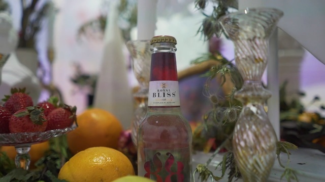 Video Reference: Drink, Liqueur, Bottle, Glass bottle, Fruit, Citrus, Plant, Distilled beverage, Vegetarian food, Food