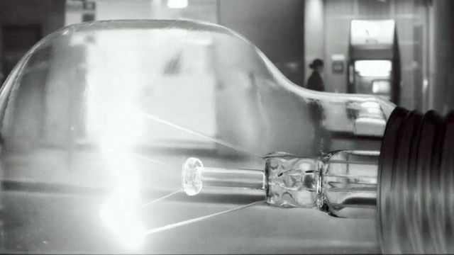 Video Reference: black and white, glass, monochrome photography, photography, automotive design, water, monochrome, automotive lighting, metal, motor vehicle, Person