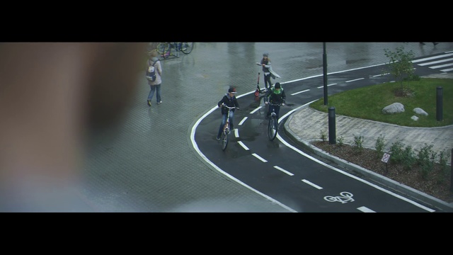 Video Reference: Road, Lane, Mode of transport, Infrastructure, Street, Screenshot, Vehicle, Thoroughfare, Photography, Bicycle