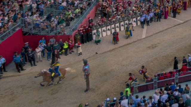 Video Reference: Crowd, Sport venue, Stadium, Audience, Sports, Arena, Event, Competition event, Race track