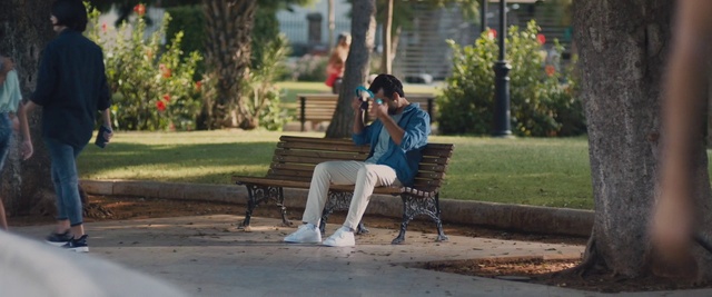 Video Reference: Sitting, Bench, Furniture, Leisure, Outdoor furniture, Reading, Leg, Tree, Photography, Table