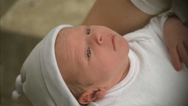 Video Reference: mother, face, skin, child, infant, nose, cheek, mouth, hand, lip, finger