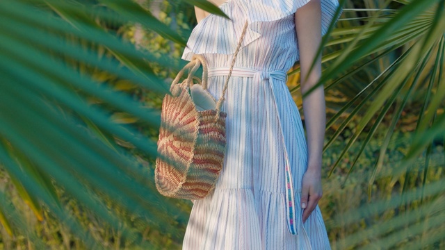 Video Reference: Blue, Clothing, Dress, Fashion, Turquoise, Textile, Grass, Grass, Shoulder, Pattern