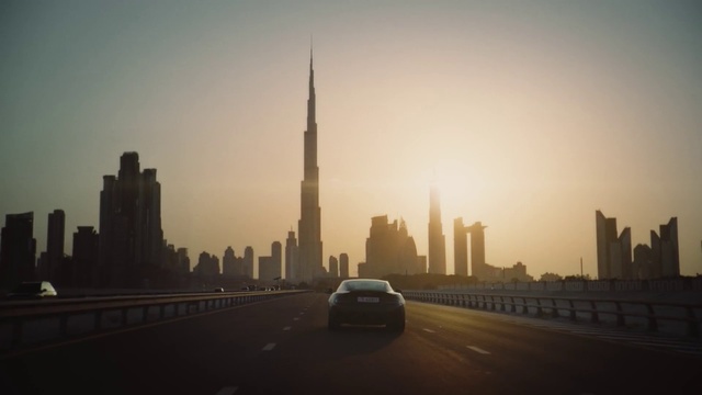 Video Reference: City, Sky, Skyscraper, Skyline, Urban area, Cityscape, Metropolitan area, Atmospheric phenomenon, Landmark, Road