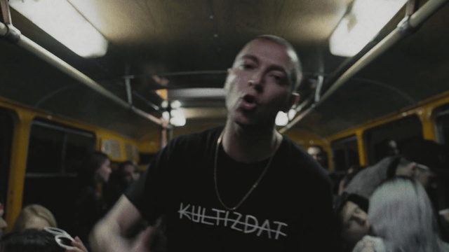 Video Reference: crowd, public transport, vehicle, muscle, fun, facial hair