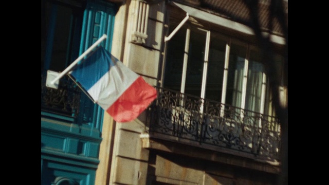 Video Reference: Flag, Architecture, Snapshot, Daylighting, Window, House, Building, Facade, Neighbourhood, Balcony