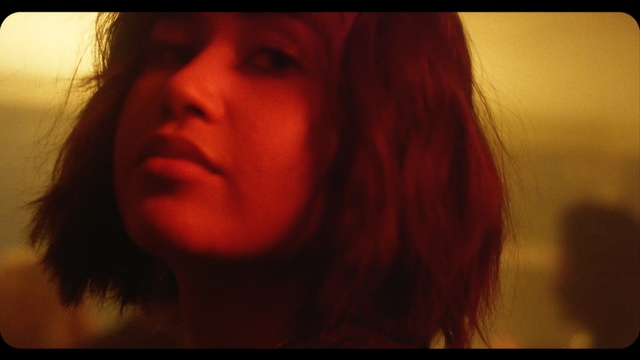 Video Reference: hair, red, nose, human hair color, lip, girl, chin, cheek, mouth, black hair