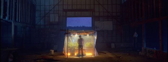 Video Reference: Stage, Light, Lighting, Heat, Flame, Fire, Darkness, Performance, Theatrical scenery, Art, Building, Table, Sitting, Front, Night, Room, Glass, Lit, Large, Laptop, Street, Water, White, Standing, Man, City, Person
