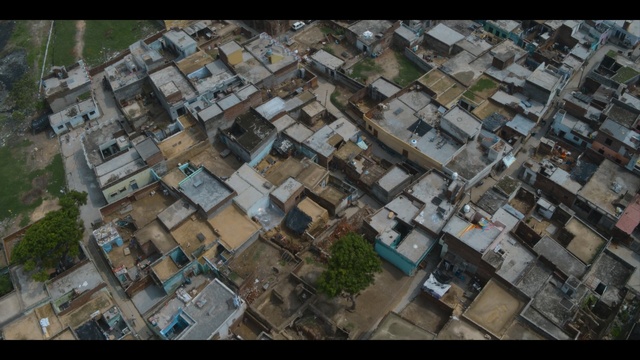 Video Reference: Aerial photography, Residential area, Suburb, Bird's-eye view, Urban area, Neighbourhood, Metropolitan area, Urban design, Human settlement, City
