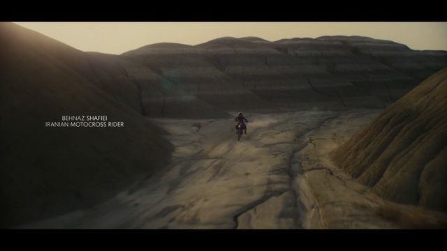 Video Reference: ecosystem, badlands, screenshot, terrain, geological phenomenon, sky, landscape, ecoregion, rock, extreme sport, Person
