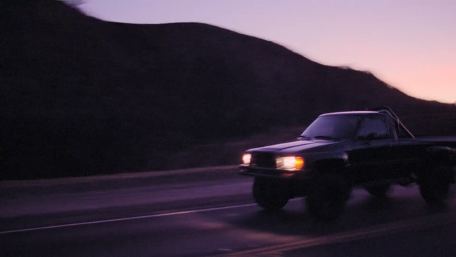 Video Reference: Car, Vehicle, Automotive exterior, Landscape, Automotive lighting, Full-size car, Bumper, Headlamp, Fender, Road