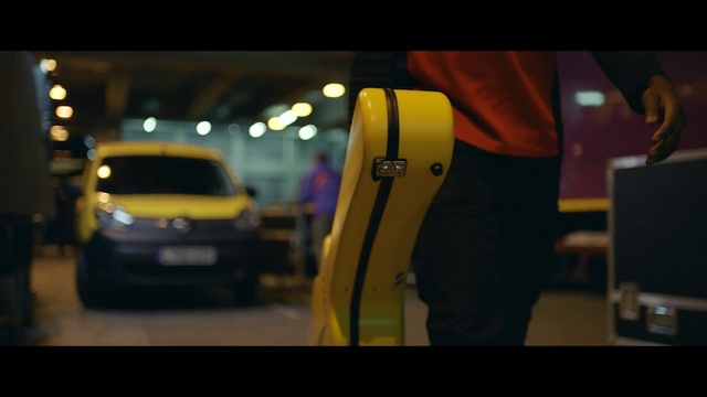 Video Reference: Motor vehicle, Yellow, Vehicle door, Vehicle, Automotive design, Mode of transport, Car, Automotive exterior, Snapshot, Night