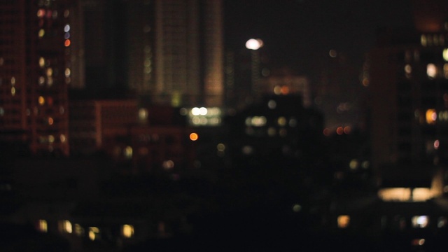 Video Reference: Night, Metropolitan area, Sky, Urban area, Light, City, Darkness, Human settlement, Metropolis, Midnight
