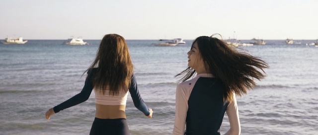 Video Reference: body of water, sea, beach, fun, vacation, girl, friendship, ocean, summer, sky, Person