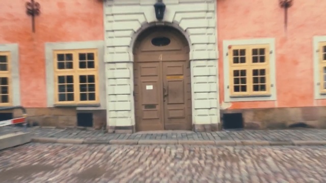 Video Reference: property, town, facade, brickwork, building, brick, window, door, house, Person