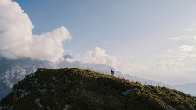 Video Reference: Sky, Mountainous landforms, Mountain, Cloud, Highland, Hill, Ridge, Atmospheric phenomenon, Fell, Mountain range