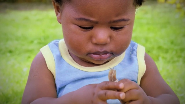 Video Reference: Child, Face, Nose, Skin, Toddler, Baby, Lip, Finger, Mouth, Eating, Person