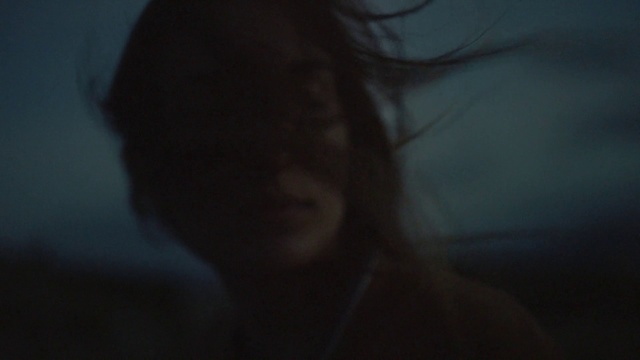 Video Reference: Eyelash, Jaw, Flash photography, Neck, Gesture, Cloud, Long hair, Darkness, Electric blue, Happy
