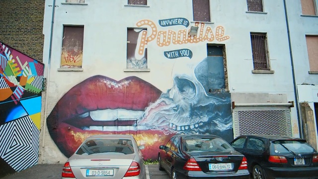 Video Reference: Street art, Mural, Wall, Art, Graffiti, Neighbourhood, Car, Architecture, Facade, Vehicle, Person