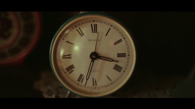 Video Reference: Watch, Clock, Still life photography, Brown, Close-up, Home accessories, Darkness, Circle, Font, Wall clock