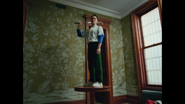 Video Reference: Curtain, Interior design, Standing, Wall, Window treatment, Room, Window, Textile, Furniture, Art