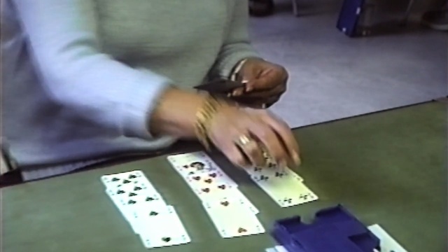 Video Reference: games, gambling, indoor games and sports, poker, tabletop game, card game, finger, hand, play, recreation, Person