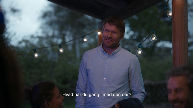 Video Reference: Sky, Tree, Adaptation, Event, Photography, Night, Leisure, Smile, Person, Outdoor, Man, Standing, Holding, Front, Looking, Umbrella, Street, Walking, Woman, Wearing, Table, Young, White, City, Phone, Rain, People, Riding, Red, Field, Sign, Ball, Shirt, Blue, Court, Human face, Clothing