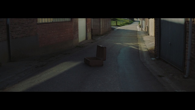 Video Reference: mode of transport, infrastructure, road, alley, light, street, screenshot, car, darkness, road surface