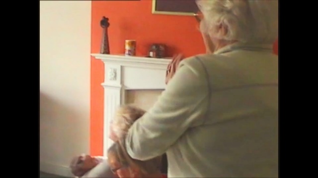 Video Reference: hair, human hair color, blond, shoulder, arm, girl, mouth, muscle, finger, furniture