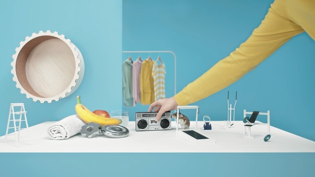 Video Reference: Yellow, Turquoise, Interior design, Room, Design, Furniture, Table, Fashion accessory, Paper