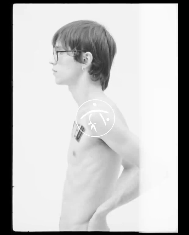Video Reference: Hair, Shoulder, Photograph, White, Eyewear, Arm, Standing, Hairstyle, Black-and-white, Joint