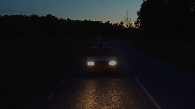 Video Reference: Sky, Automotive lighting, Night, Light, Mode of transport, Atmospheric phenomenon, Vehicle, Car, Road, Headlamp