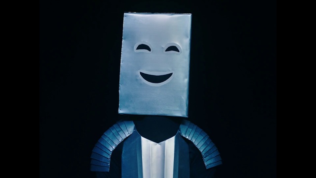 Video Reference: Art, Smile, Sculpture, Paper, Paper product, Person