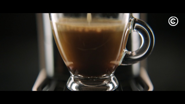 Video Reference: cup, espresso, beverage, coffee, drink, glass, punch, alcohol, mixed drink, mug, tea, liquid, brown, refreshment, hot