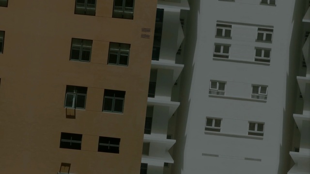 Video Reference: property, architecture, building, apartment, facade, window, house, condominium, home, real estate, Person