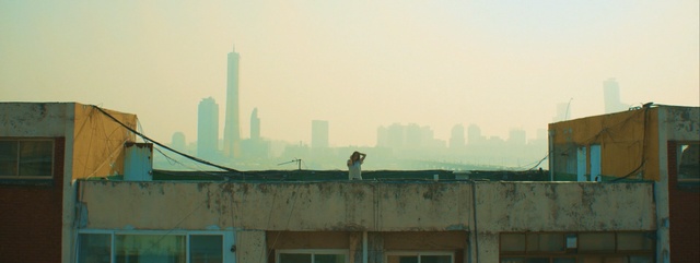 Video Reference: sky, urban area, morning, skyline, city, residential area, wall, haze, roof, building