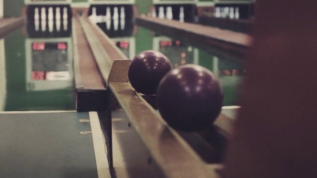 Video Reference: Bowling, Bowling equipment, Ball, Bowling ball, Ten-pin bowling, Individual sports, Duckpin bowling, Games, Candlepin bowling, Sports equipment, Indoor, Sitting, Table, Small, Front, Black, Computer, Desk, Red, Room, Cat, Man, White, Text, Food, Bowling pin, Fruit, Bowler, Five-pin bowling