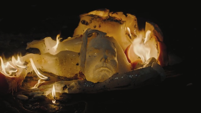 Video Reference: Flame, Fire, Heat, Rock, Cake, Food, Ice, Cream, Table, Dessert, Sitting, Chocolate, Plate, Piece, Desert, Dark, Eaten, Covered, Fork, Lit, Black, Birthday, White, Dog, Water, Man, Statue, Candle