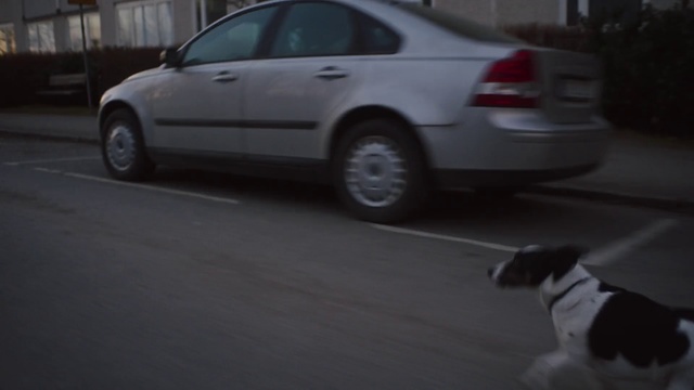 Video Reference: Land vehicle, Vehicle, Car, Public space, Mid-size car, Luxury vehicle, Parking, Infrastructure, Road, Photography, Person