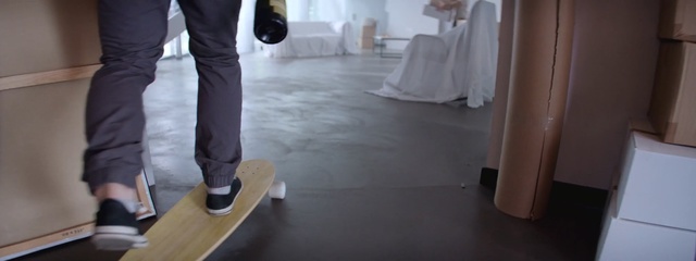 Video Reference: floor, room, flooring, furniture, suit, shoe, wood