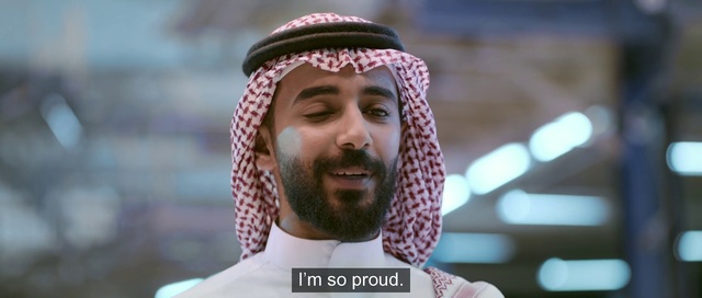 Video Reference: Hair, Facial hair, Moustache, Beard, Facial expression, Forehead, Nose, Headgear, Smile, Photo caption