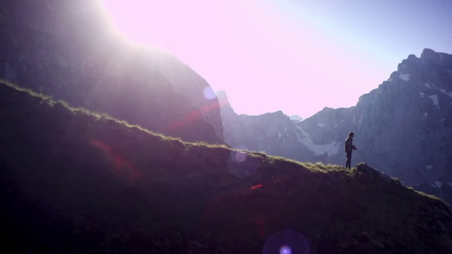 Video Reference: Mountainous landforms, Mountain, Sky, Atmospheric phenomenon, Light, Mountain range, Highland, Ridge, Hill station, Valley