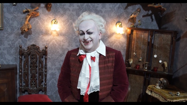 Video Reference: Gentleman, Screenshot, Fun, Fictional character, Photography, Temple, Fiction, Smile, Supervillain, Art
