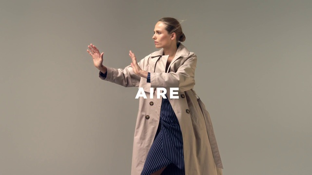 Video Reference: Trench coat, Clothing, Coat, Outerwear, Overcoat, Fashion, Sleeve, Fashion design, Gesture, Beige