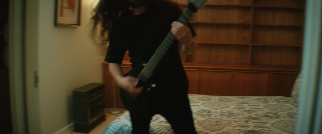 Video Reference: Shoulder, Standing, Guitarist, Guitar, Leg, Joint, Human body, Musician, Fun, Bass guitar, Person